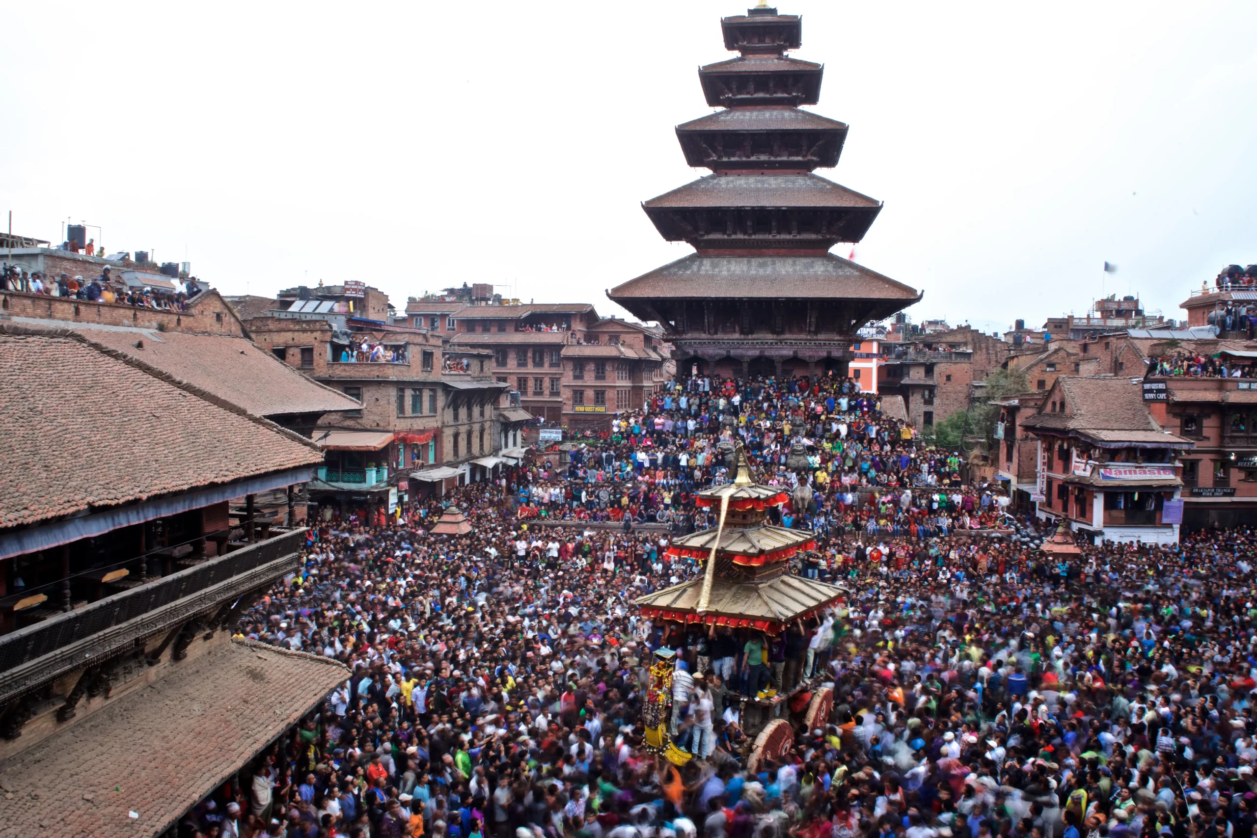 Bisket Jatra celebration in Bhaktapur During Nepali New Year with traditional chariot pulling and vibrant local crowd.