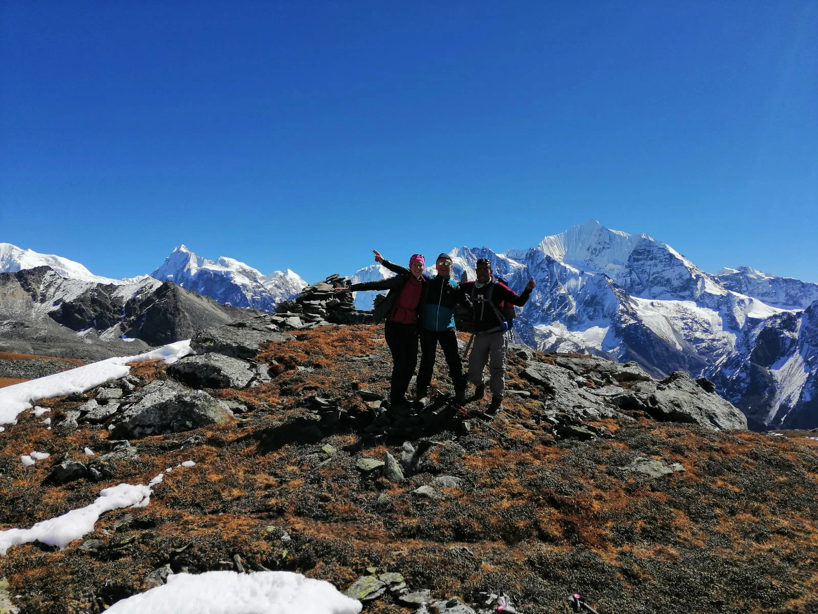 Climbers ascending Tserko Ri for panoramic Himalayan views.