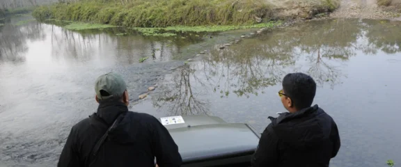 Crossing river during jungle safari in Chitwan National Park.