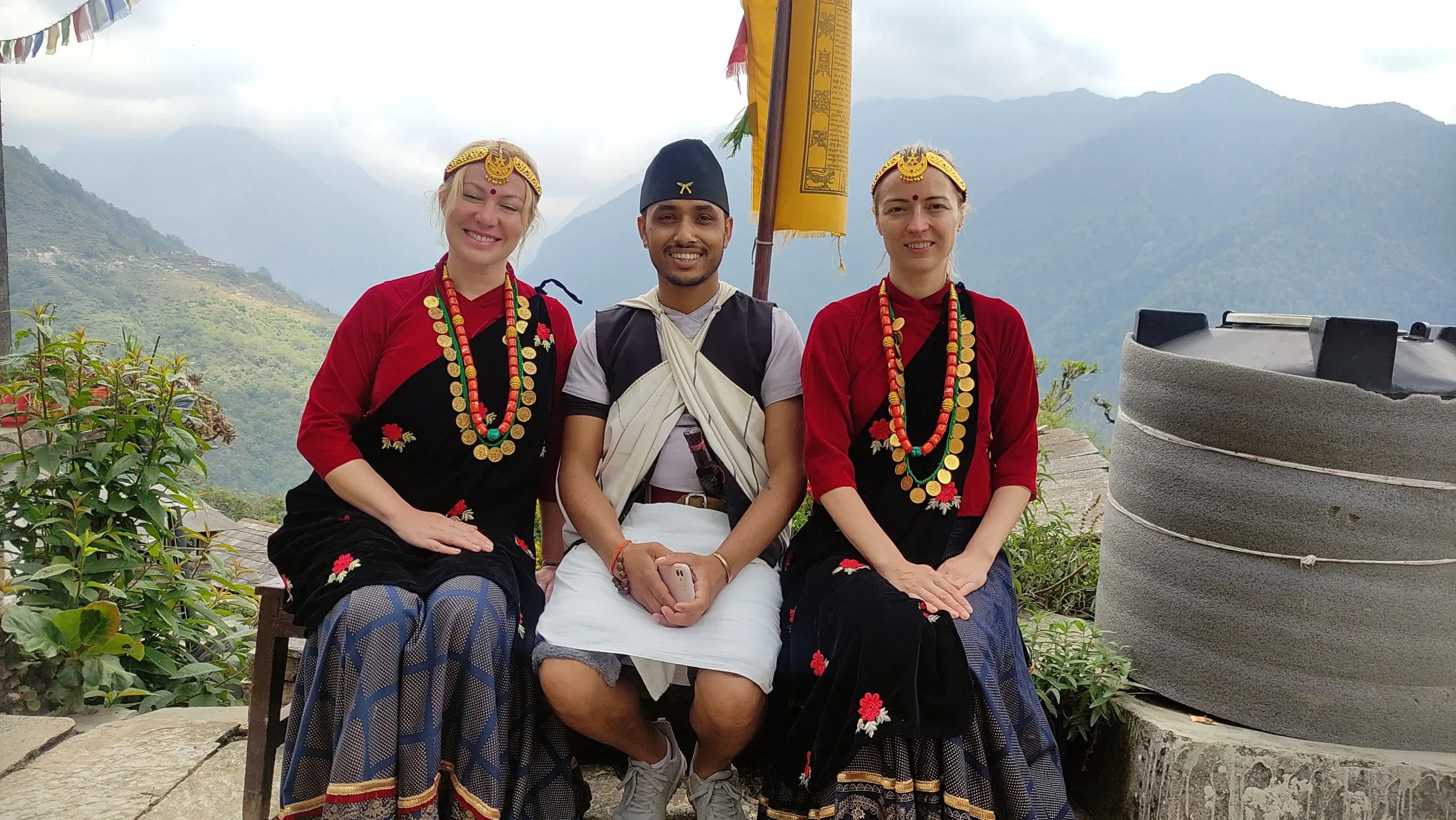 Our clients wearing traditional Gurung dress during theshort annapurna Base Camp Trek in Nepal.