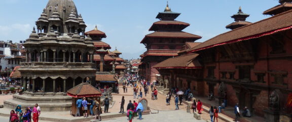 Patan Durbar Square, central to Newari culture, featuring historic buildings and architectural splendor.