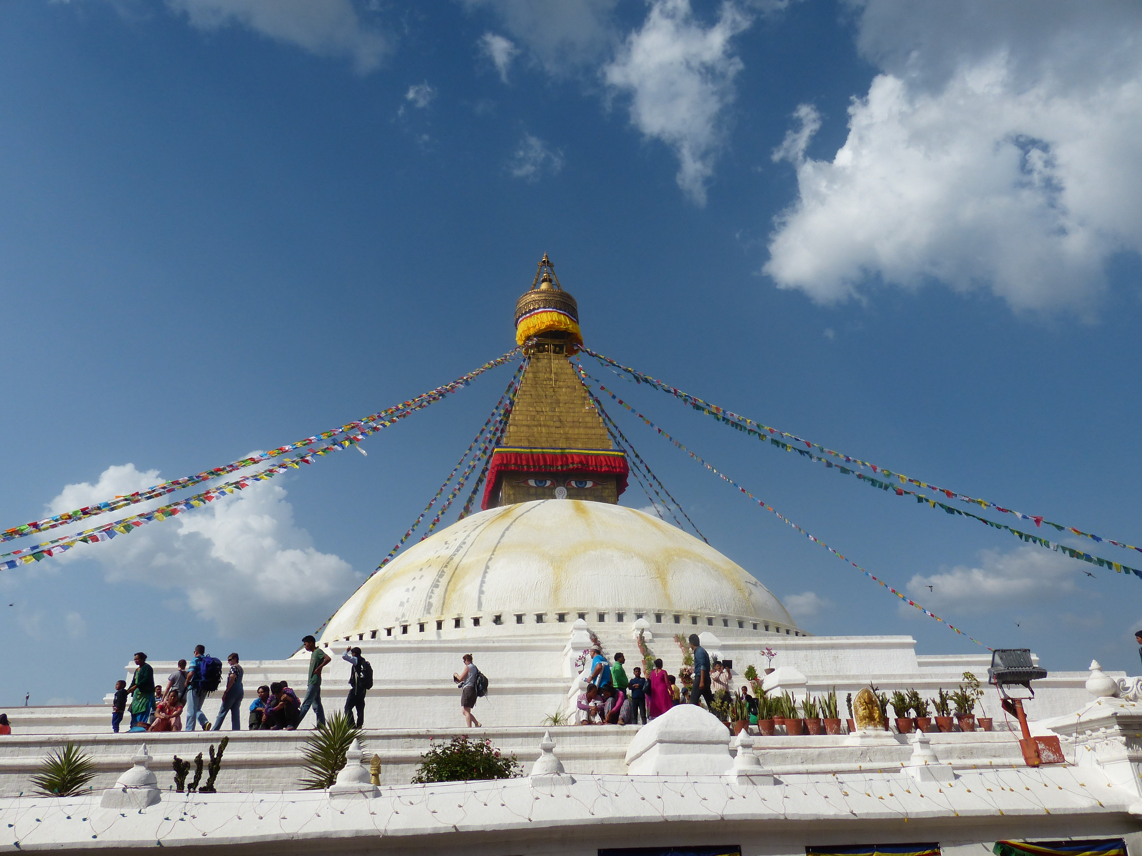 View of the Boudhanath Stupa, one of the largest and most iconic stupas in Nepal, known for its peaceful ambiance and vibrant surroundings, located in the heart of Kathmandu Valley.