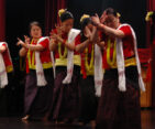 Magar women performing a traditional dance, dressed in colorful attire and showcasing their rich cultural heritage.