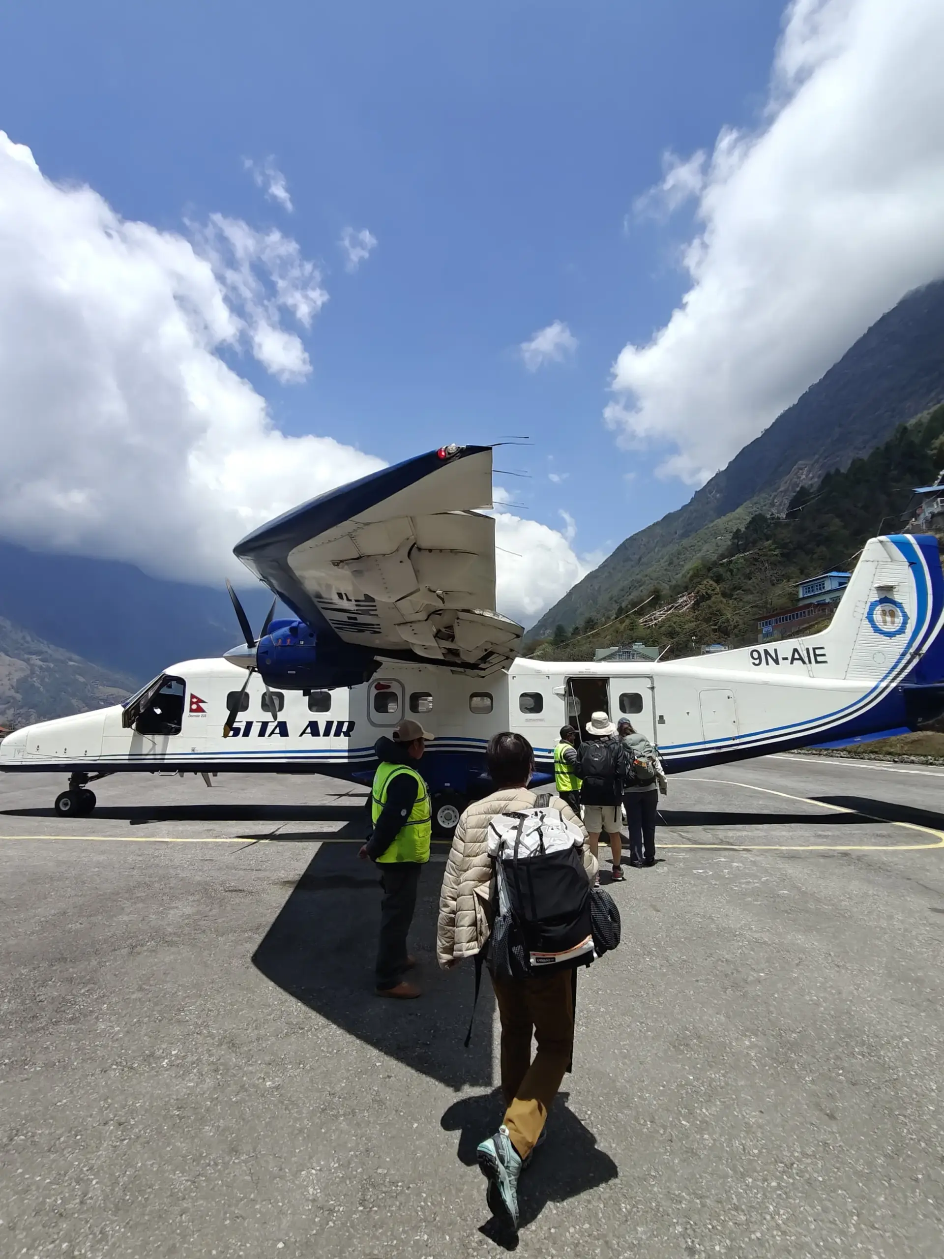 Boarding the flight from Lukla to Kathmandu after Everest Base Camp trek.