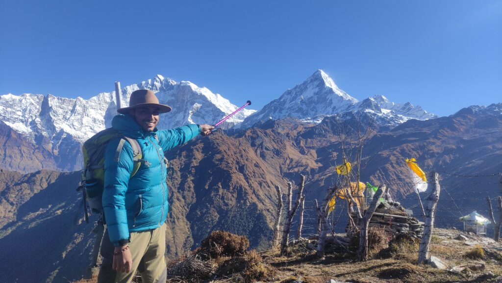 Panoramic view from the summit of Khopra Danda, revealing expansive mountain vistas and serene valleys.