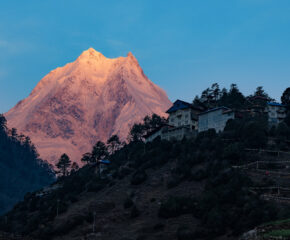 Sunset view of Mt. Manaslu during the Tsum Valley and Ganesh Himal Base Camp Trek, capturing the mountain's majestic glow.
