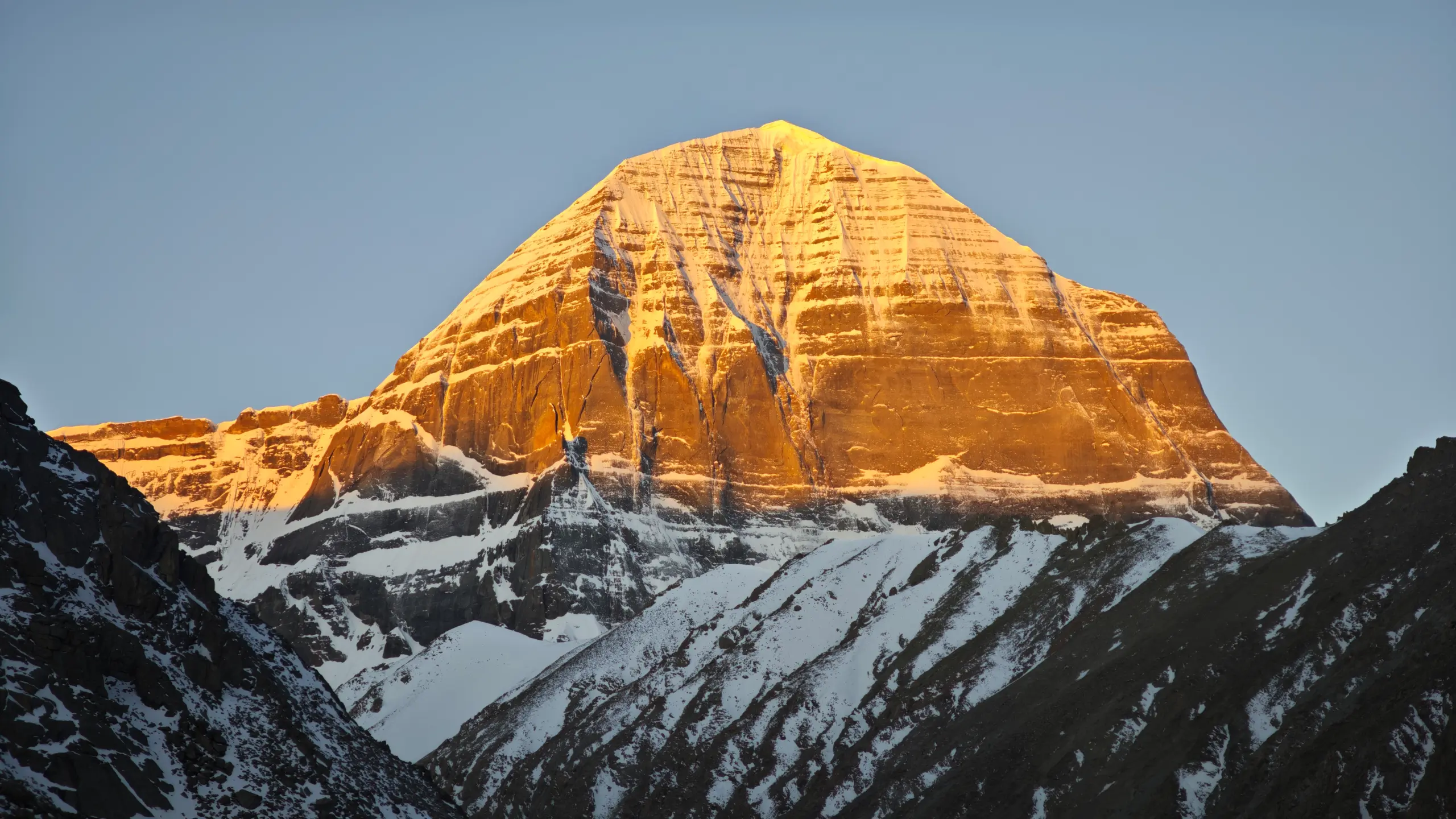 Golden sunrise view of sacred Mount Kailash during the Kailash Mansarovar Yatra pilgrimage from Nepal in 2026