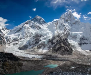 Panoramic view of Mt. Everest, Lhotse, Nuptse, Khumbu Icefall, and the glacier from the top of Kala Patthar, offering a stunning glimpse of the Himalayas.