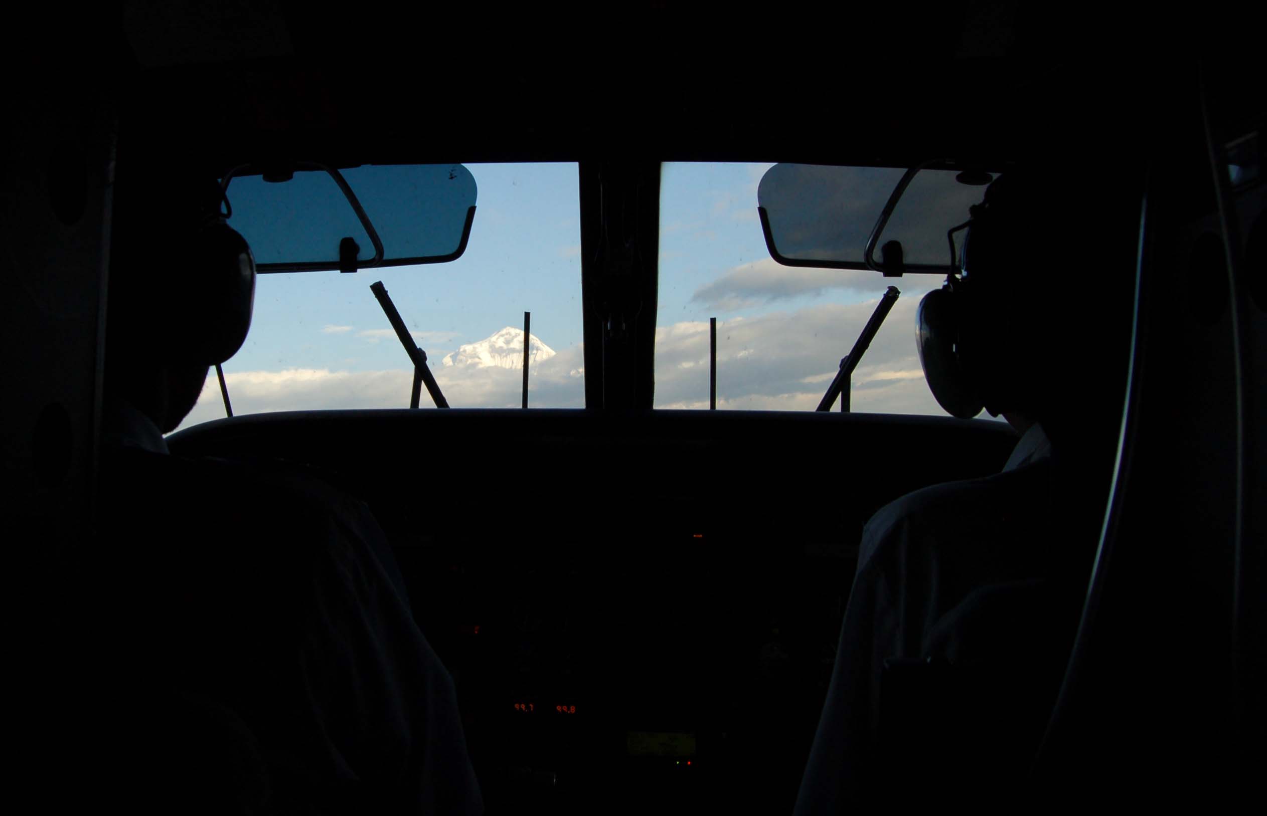 Views of Dhaulagiri from the cockpit of the plane flying to Jomsom: A breathtaking view of Mount Dhaulagiri from the cockpit of a plane flying towards Jomsom Airport.