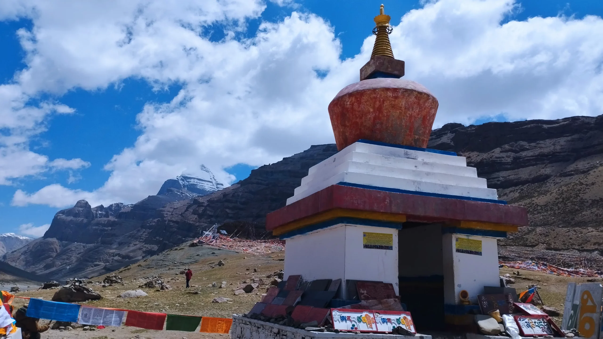 Stunning sight of Kailash Parbat alongside a sacred Tibetan stupa.