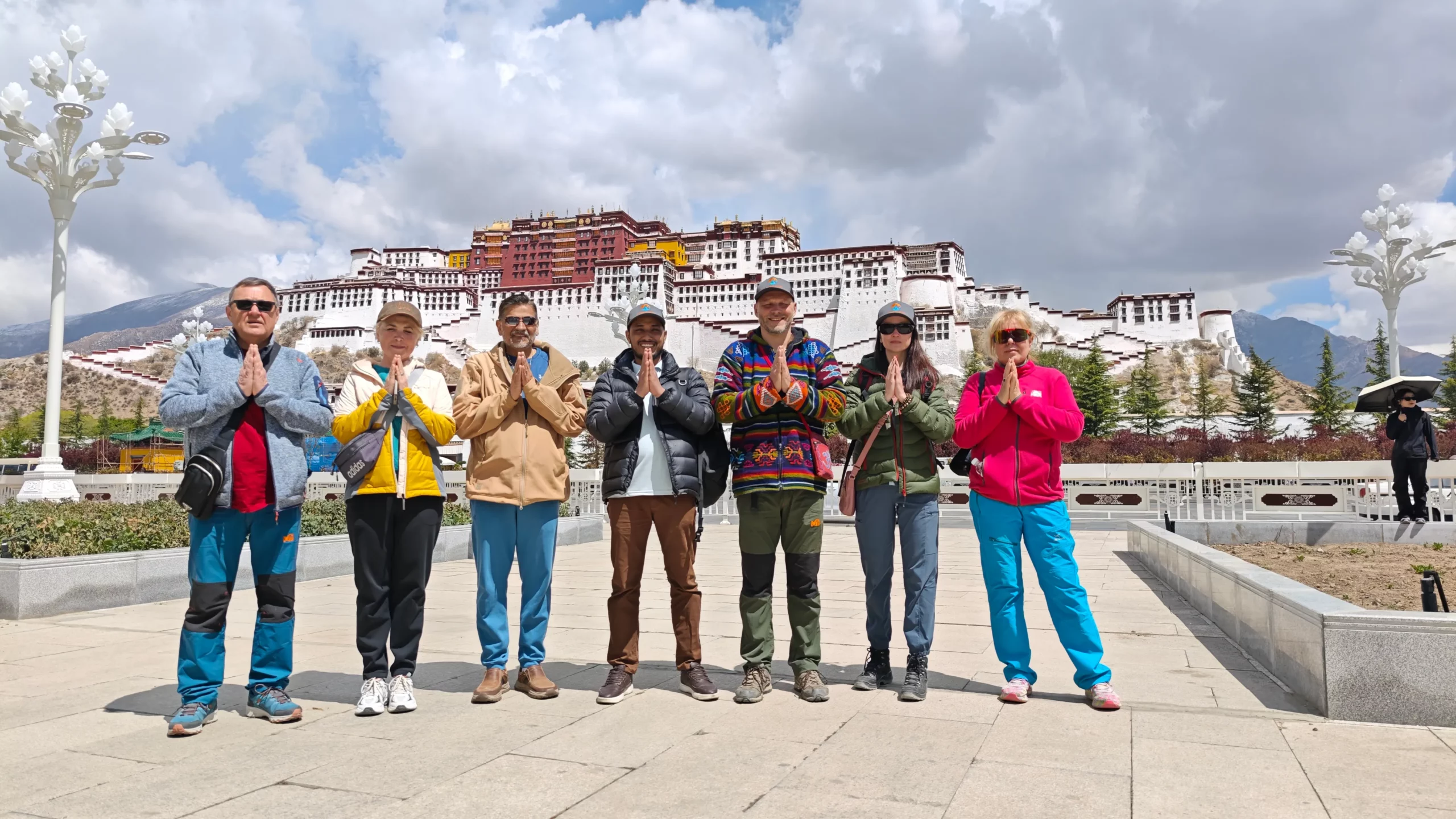 Team in front of Potala Palace – Team Namaste Nepal group photo in front of iconic Potala Palace.