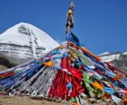 Colorful prayer flags at Mount Kailash during the sacred Saga Dawa Festival pilgrimage in Tibet