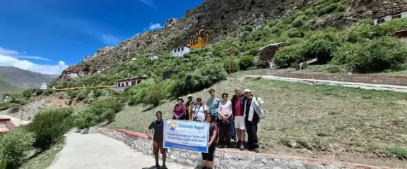 Pilgrims and travelers visiting the sacred Drak Yerpa Cave complex near Lhasa during the Kailash Manasarovar Yatra with Everest Base Camp and Lhasa tour.