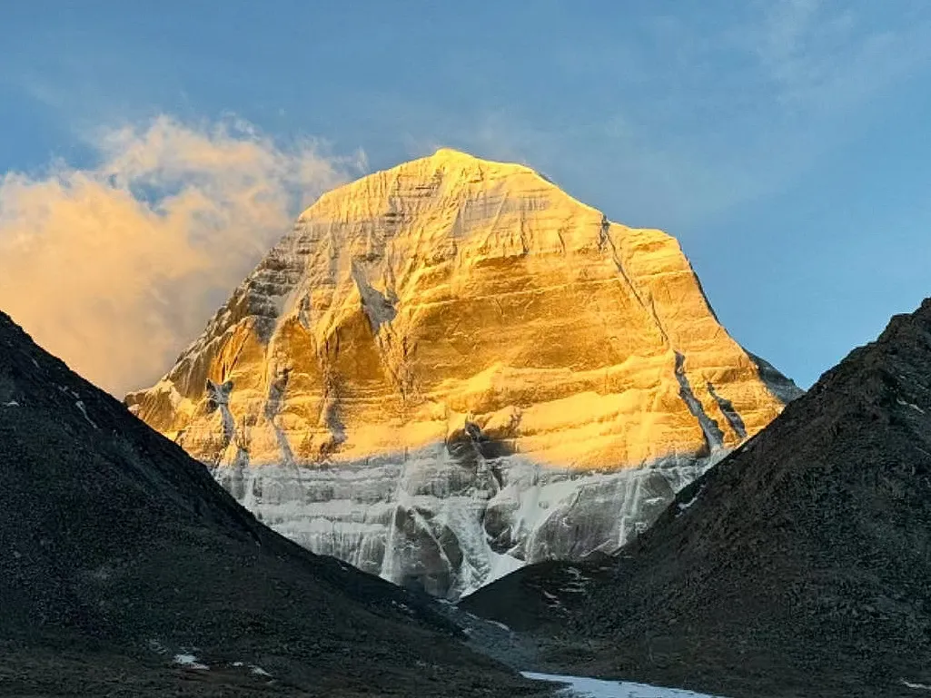 Magnificent sunset illuminating Mount Kailash, highlighting its spiritual aura and serene beauty.
