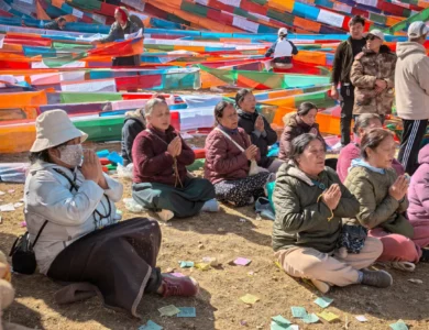 Visitors in prayer at the sacred Saga Dawa Festival at Mount Kailash.