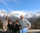 Beautiful Family with small Kids enjoing stunning view at Everest View Hotel during the Mount Everest Base Camp Helicopter Tour.