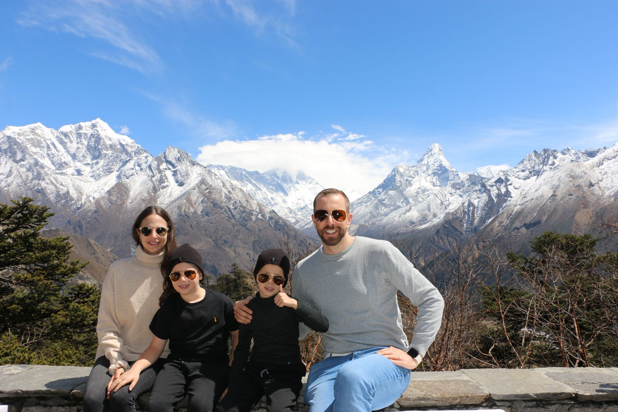 Beautiful Family with small Kids enjoing stunning view at Everest View Hotel during the Mount Everest Base Camp Helicopter Tour.