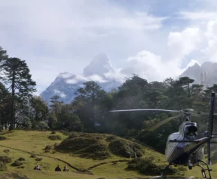Helicopter stationed near Everest View Hotel during the 1-day Mount Everest Helicopter Tour.