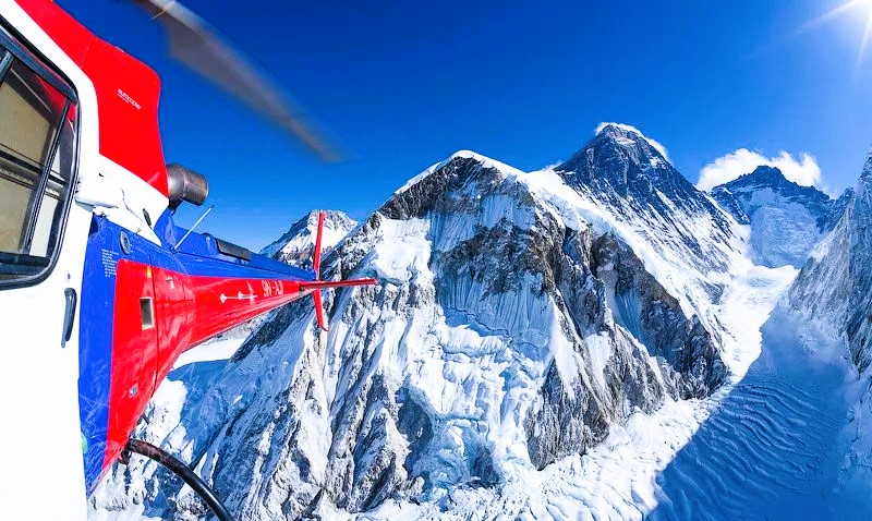 A breathtaking aerial view of Mount Everest from the helicopter during the Mount Everest Helicopter Tour.