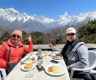 Clients enjoying breakfast with a stunning view at Everest View Hotel during the Mount Everest Helicopter Tour.