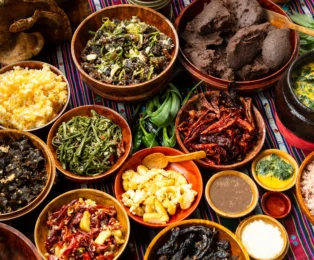Authentic Bumdeling-style traditional Bhutanese meal served on a wooden platter