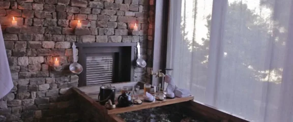 Traditional hot stone bath experience in Bhutan, showcasing local wellness culture and Himalayan healing practice.