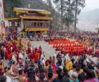 Traditional dance during a Paro festival – cultural highlight of the Bhutan Tour.