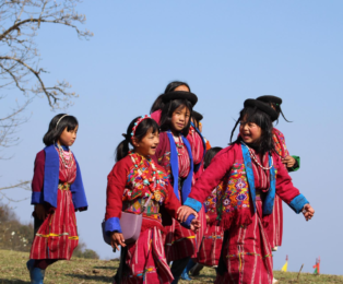 Young happy people of Bhutan reflecting warm hospitality, traditional attire, and everyday life in the Himalayan kingdom.