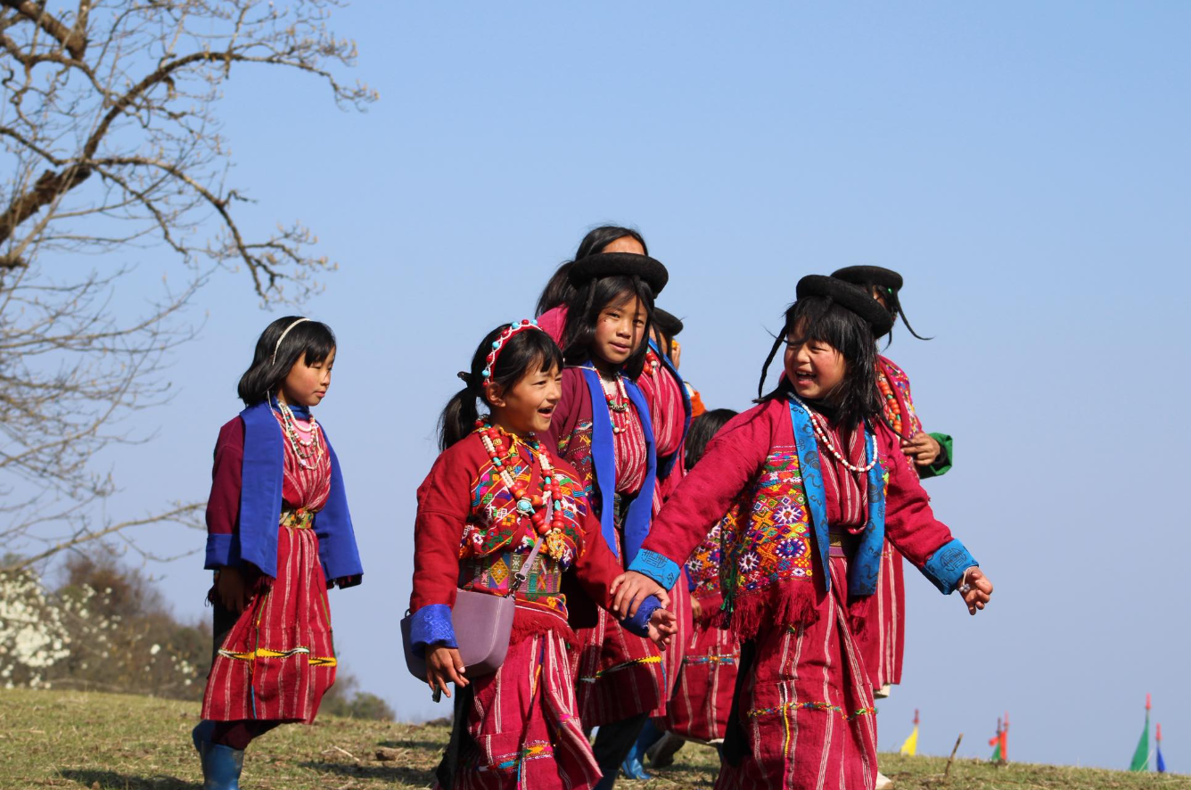 Young happy people of Bhutan reflecting warm hospitality, traditional attire, and everyday life in the Himalayan kingdom.