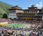Traditional Bhutanese festival showcasing masked dances and cultural heritage on Bhutan Tour 3 Nights 4 Days.