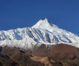 Mount Manaslu, the Mountain of Spirit, seen on the Manaslu Circuit Trek from Pokhara.