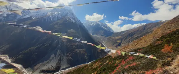 Viewpoint with prayer flags along the Manaslu Circuit Trek from Pokhara.
