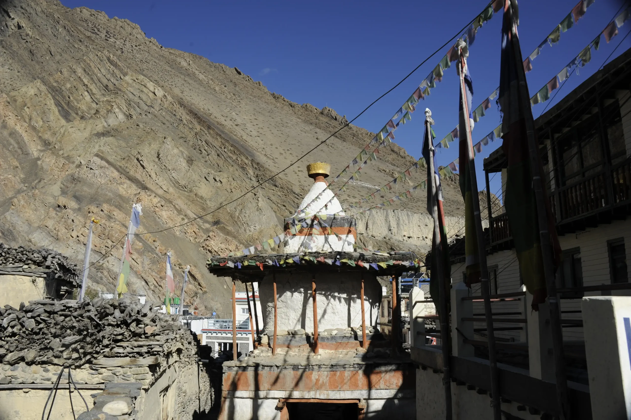 Local village with colorful stupa along the Annapurna Circuit Trek from Pokhara