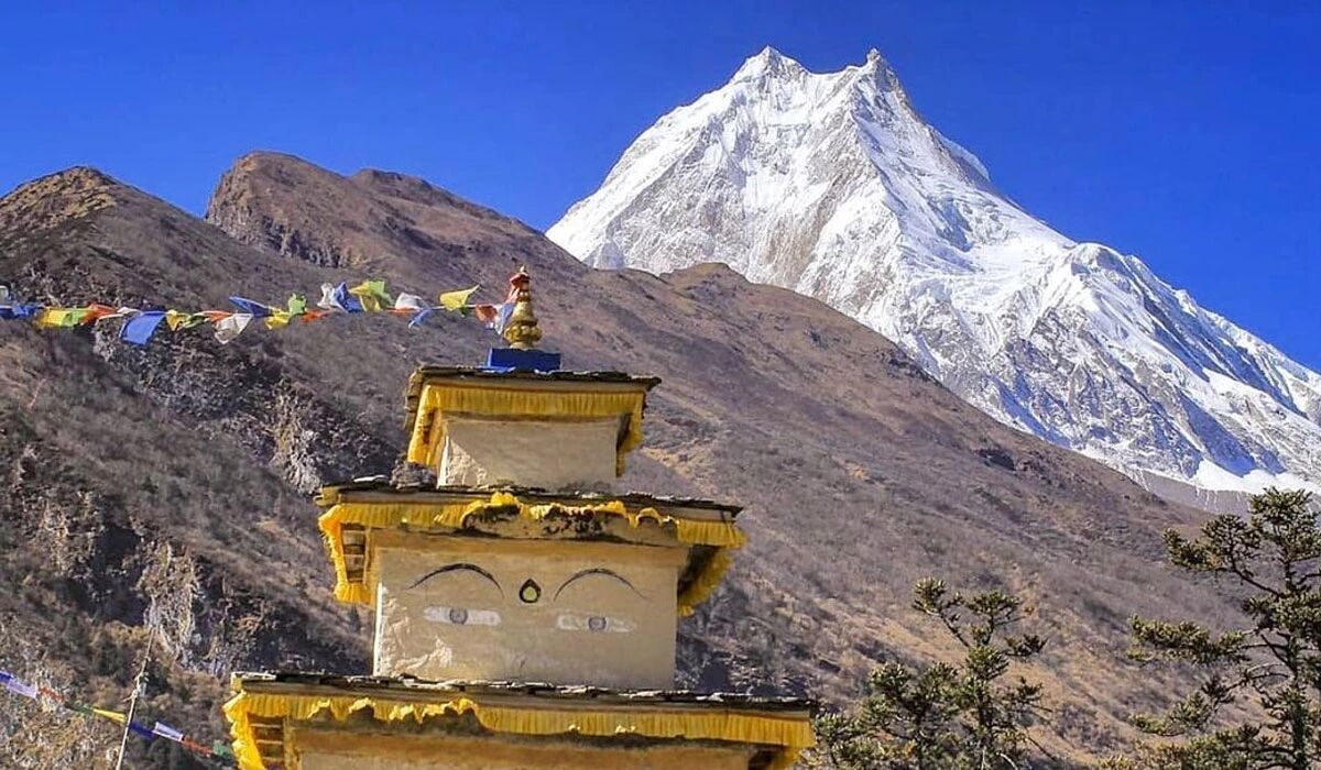 Mount Manaslu, the Mountain of Spirit, with stupa on the Manaslu Circuit Trek from Pokhara.