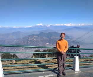 Kamal Dhodari in Pokhara leading a cultural sightseeing tour.