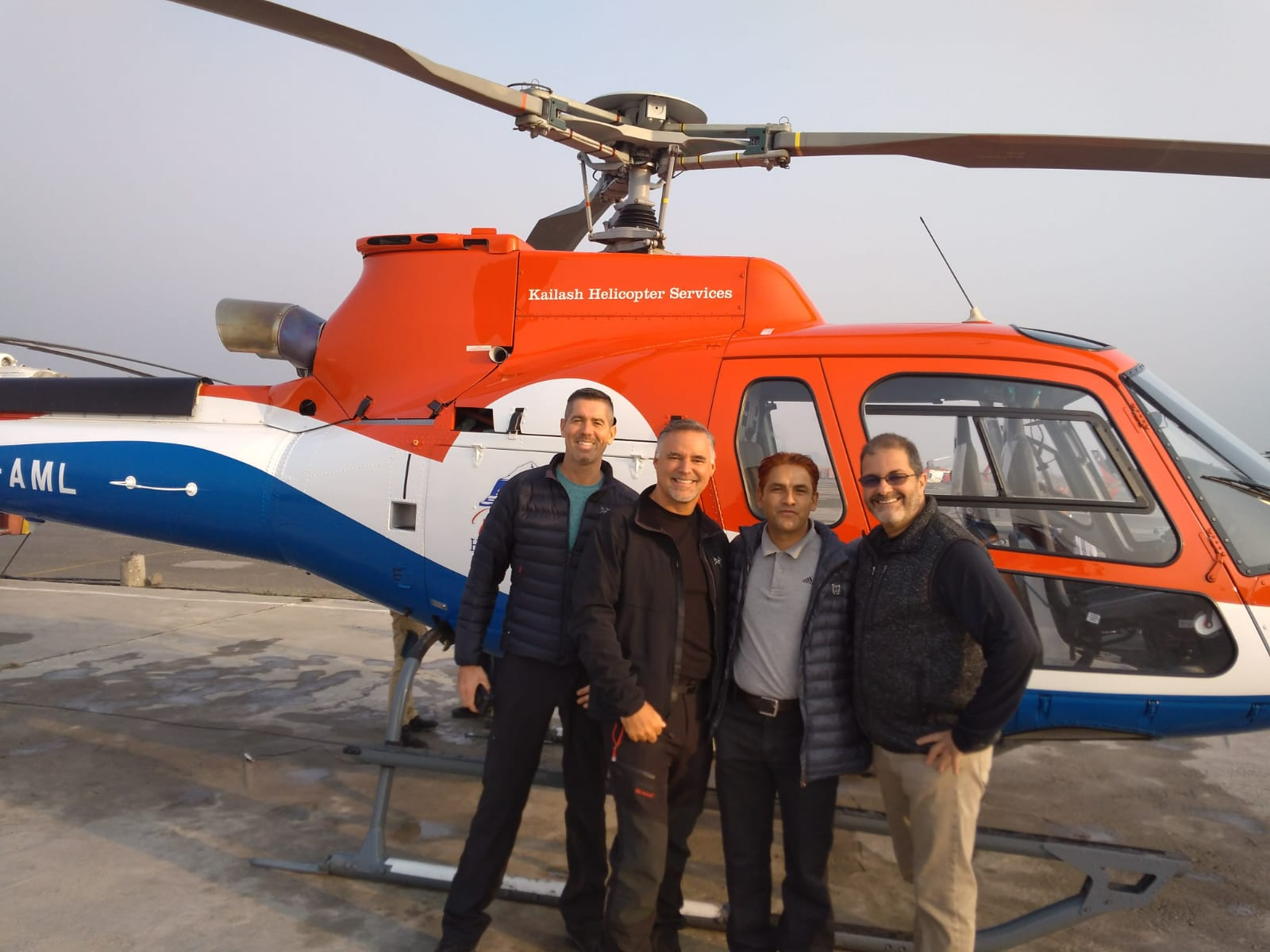 Kamal Dhodari with group during Everest helicopter tour experience in Nepal.