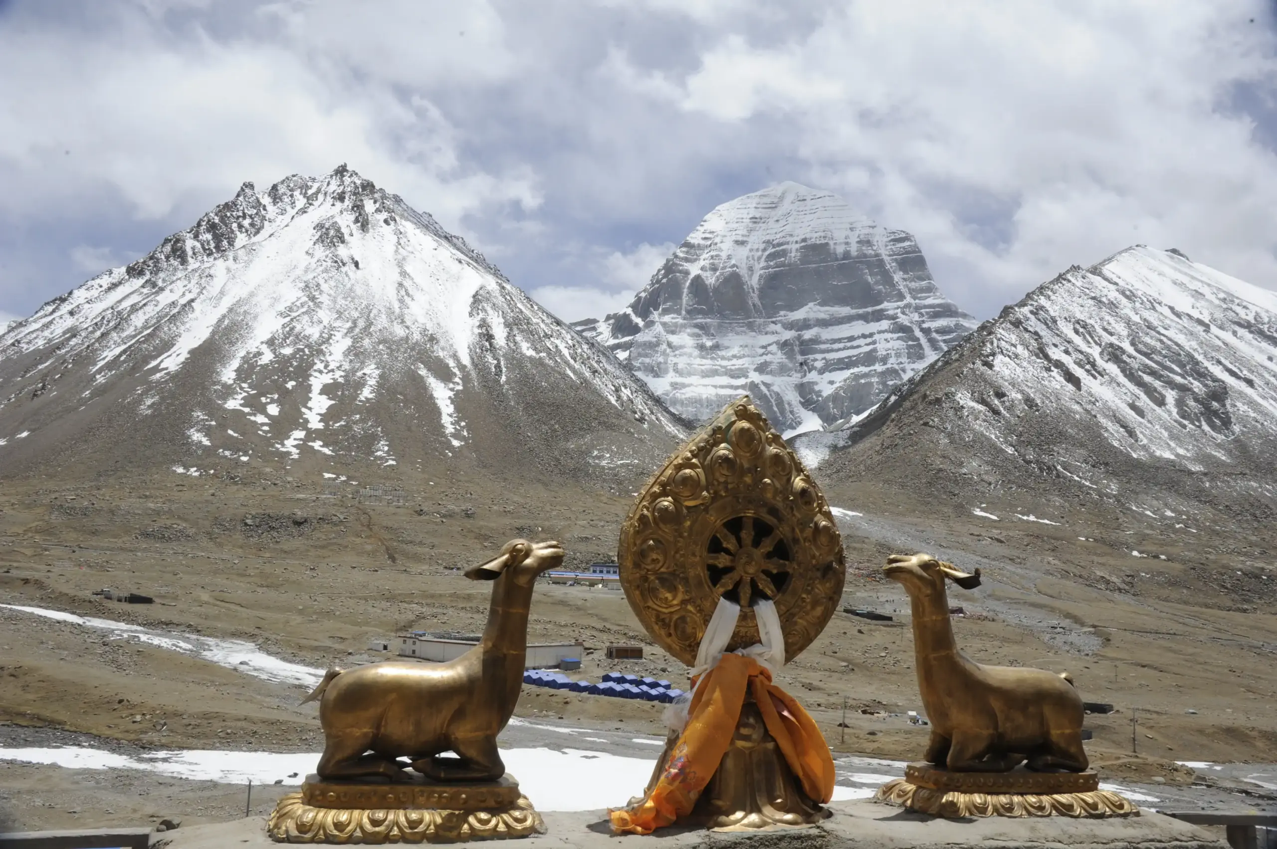 Golden Buddhist symbols with Mount Kailash north face near Diraphuk during Kailash Mansarovar Yatra