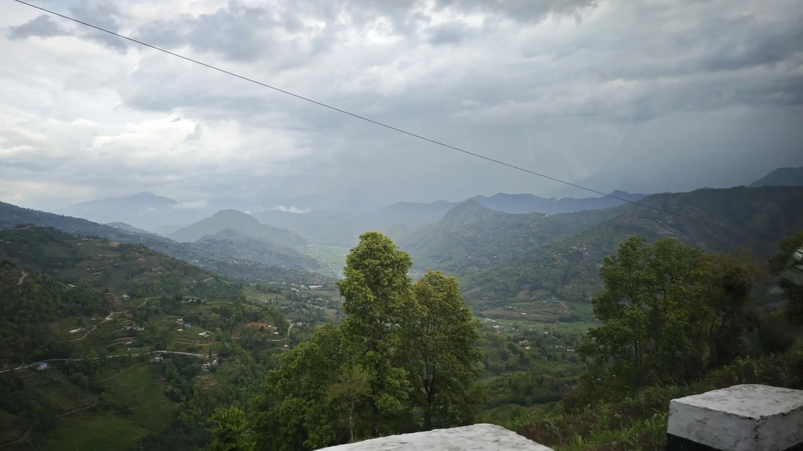 Beautiful green Himalayan valley landscape viewed during the overland journey to Kailash Mansarovar Yatra 2026