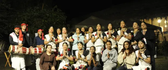 Group photo after the Tharu cultural dance performance in Chitwan National Park during the Best of Nepal Tour.