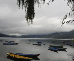Scenic Phewa Lake in Pokhara on the Best of Nepal Tour.